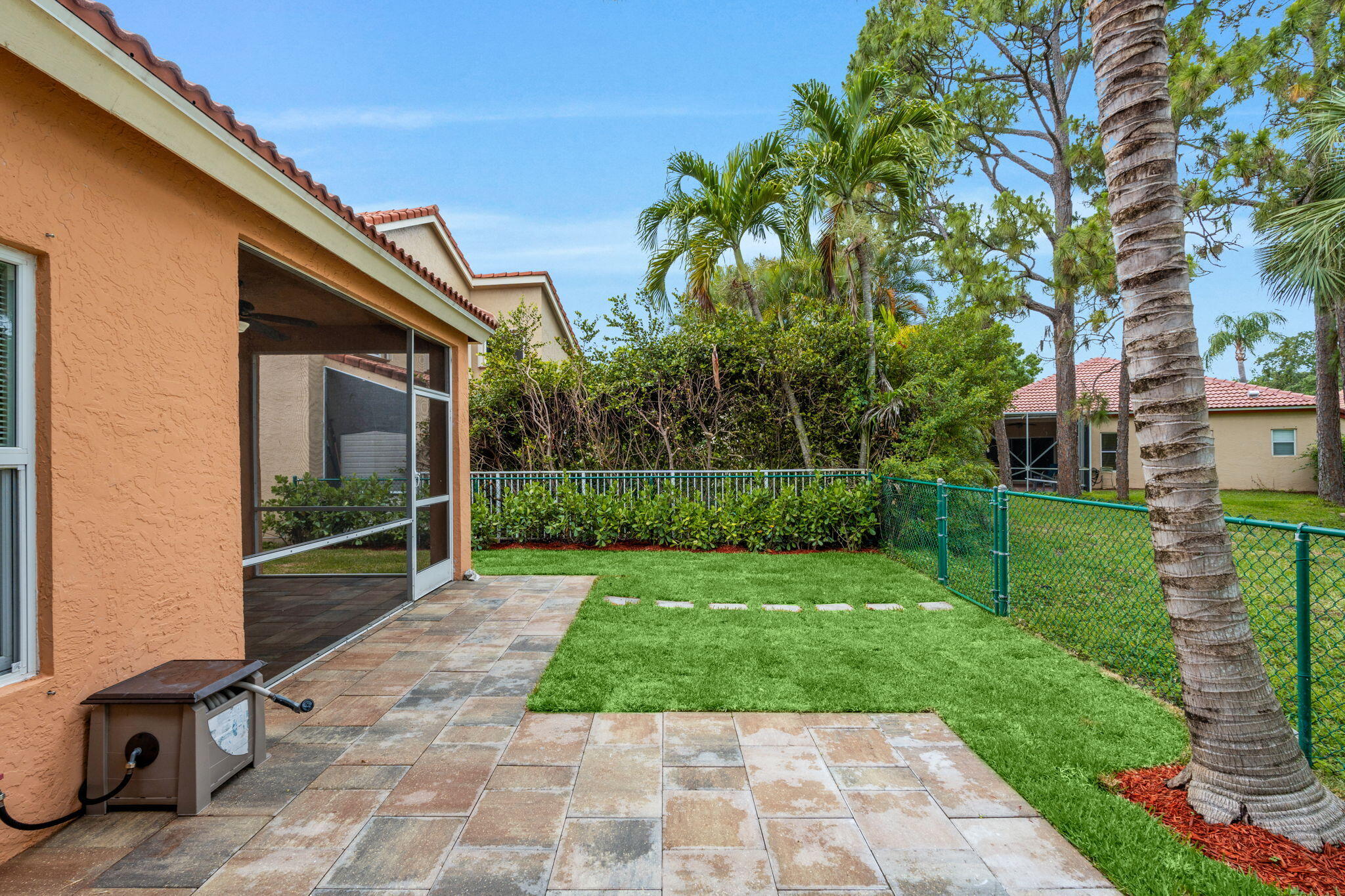 5122 Elpine Way Riviera Beach, FL 33418 - Photo 12 of 35 a view of a back yard