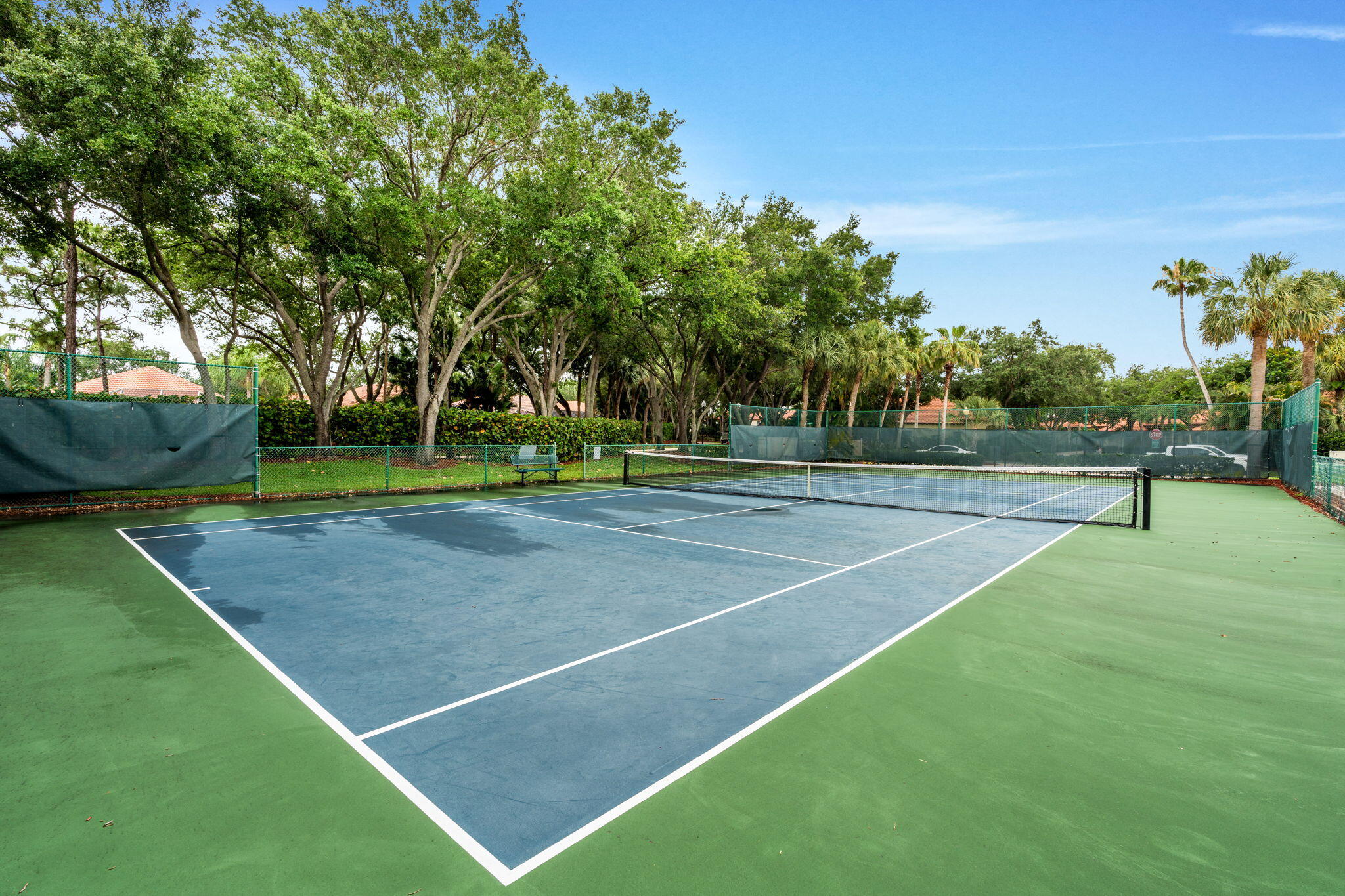 5122 Elpine Way Riviera Beach, FL 33418 - Photo 8 of 35 a view of a tennis court