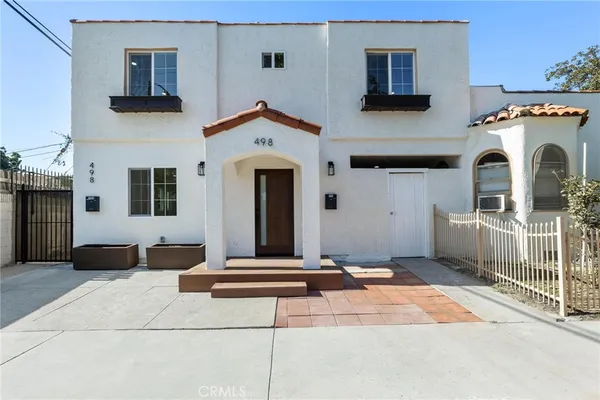 a front view of a house with windows