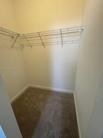 a view of small space with racks on the wall