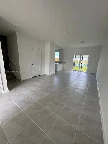 a bathroom with a sink toilet and a mirror