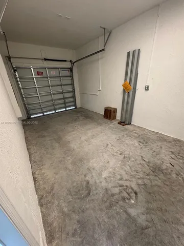 a view of hallway with windows