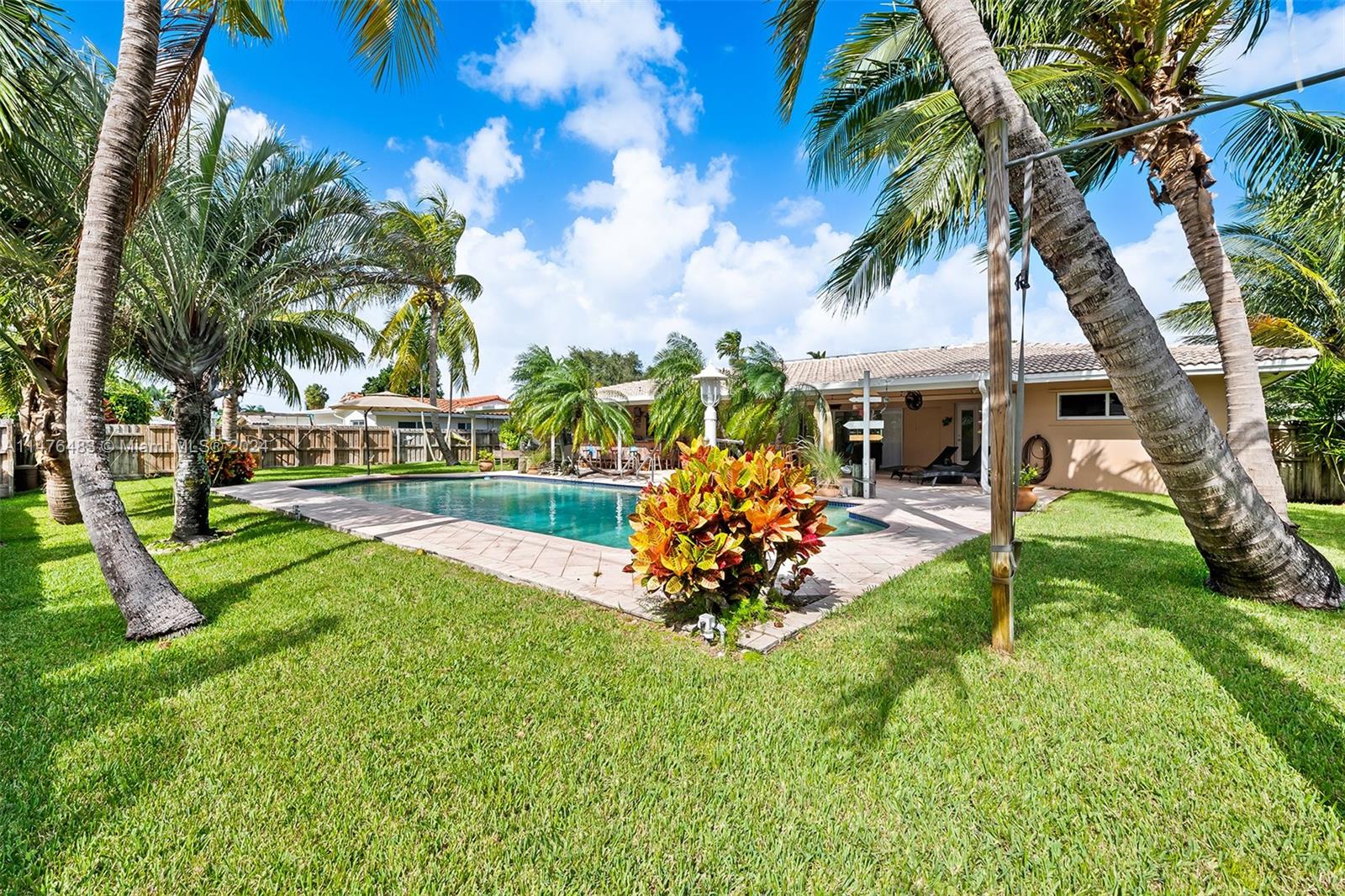 5000 Pierce Street Hollywood, FL 33021 - Photo 2 of 2 a view of a house with backyard porch and sitting area