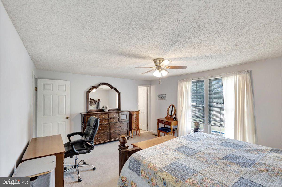 13226 Susquehanna Road Baltimore, MD 21220 - Photo 23 of 43 a bedroom with a bed window and furniture