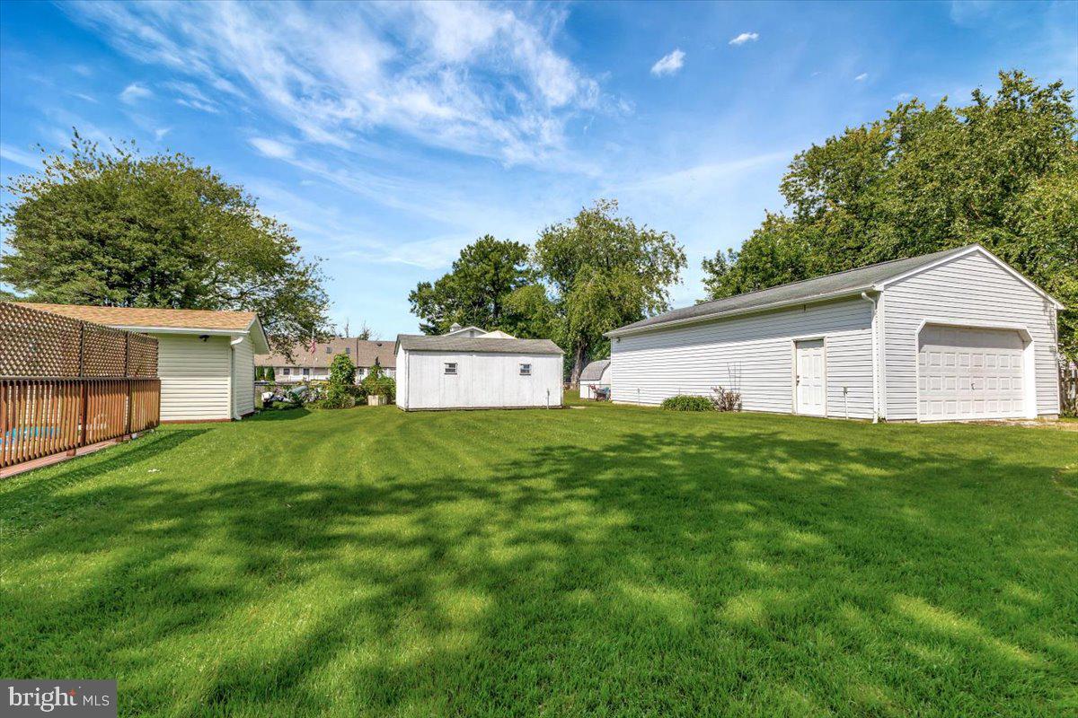 13226 Susquehanna Road Baltimore, MD 21220 - Photo 42 of 43 a view of a backyard with large trees