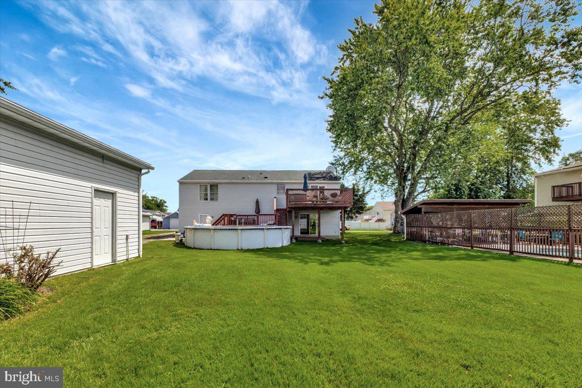 13226 Susquehanna Road Baltimore, MD 21220 - Photo 43 of 43 a view of a house with a big yard and sitting area