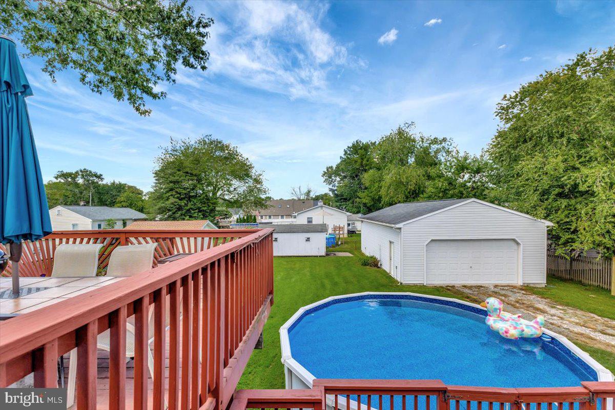 13226 Susquehanna Road Baltimore, MD 21220 - Photo 9 of 43 a view of a swimming pool with a patio and yard