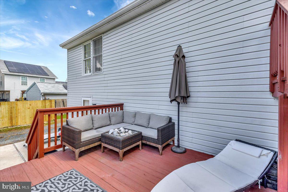 13226 Susquehanna Road Baltimore, MD 21220 - Photo 10 of 43 a roof deck with couch and chairs
