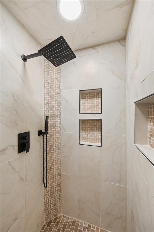 2804 Bent Tree Lane Arlington, TX 76016 - Photo 26 of 32 a bathroom with a shower and a sink