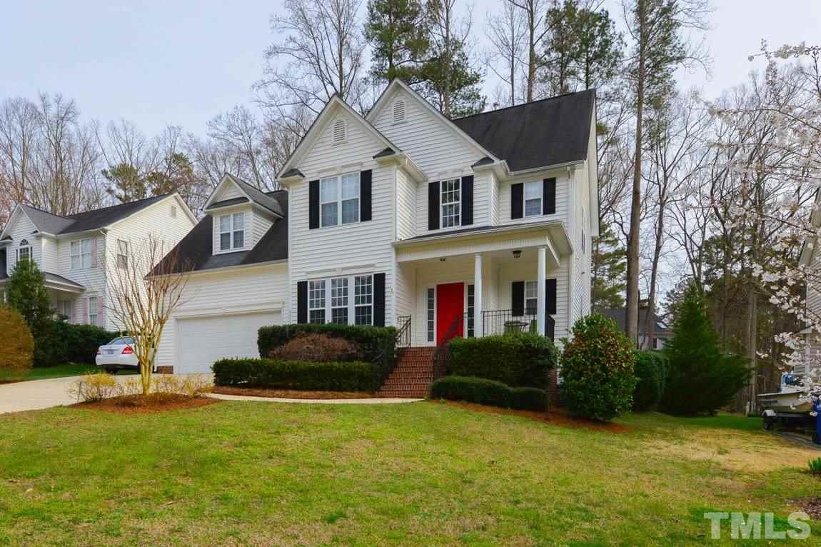 4415 Pike Road Raleigh, NC 27613 - Photo 1 of 19 a front view of a house with a yard