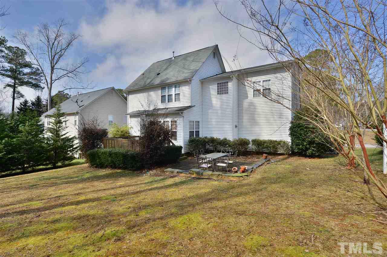 4415 Pike Road Raleigh, NC 27613 - Photo 19 of 19 a front view of a house with a yard