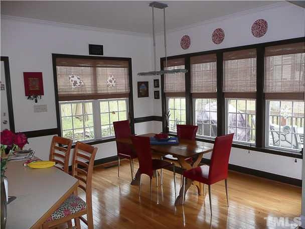 4415 Pike Road Raleigh, NC 27613 - Photo 5 of 19 a view of a dining room with furniture window and outside view