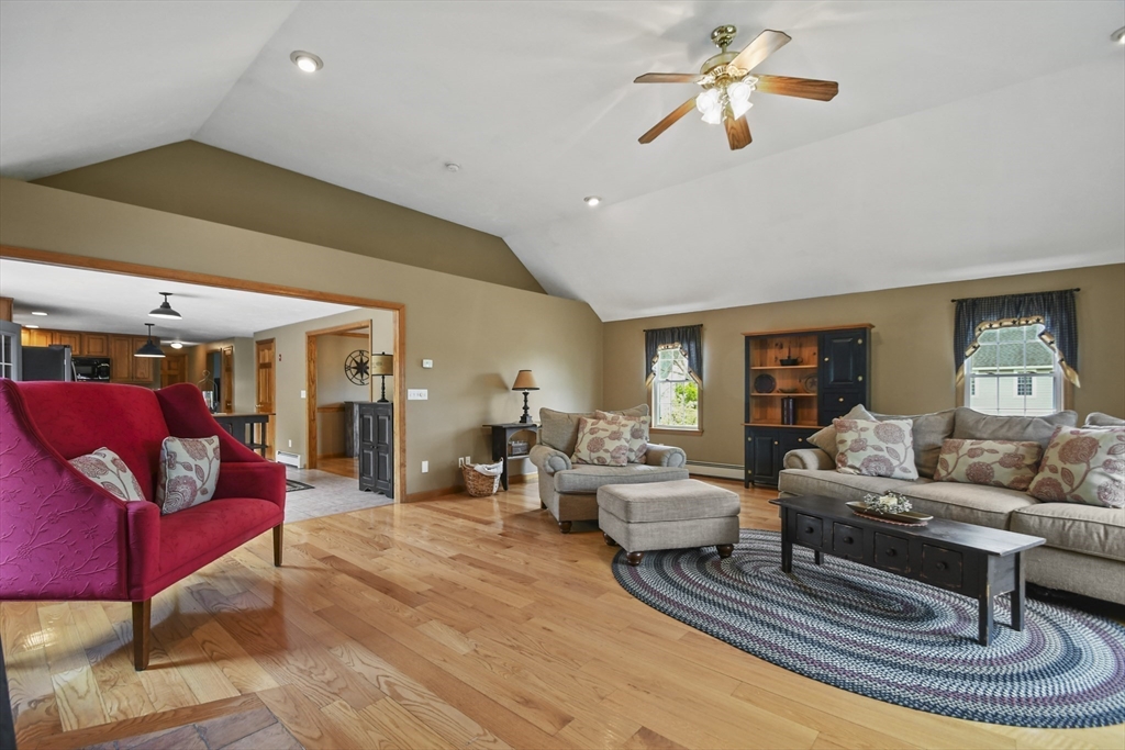 18 Jackson Avenue Rutland, MA 01543 - Photo 8 of 24 a living room with furniture and wooden floor