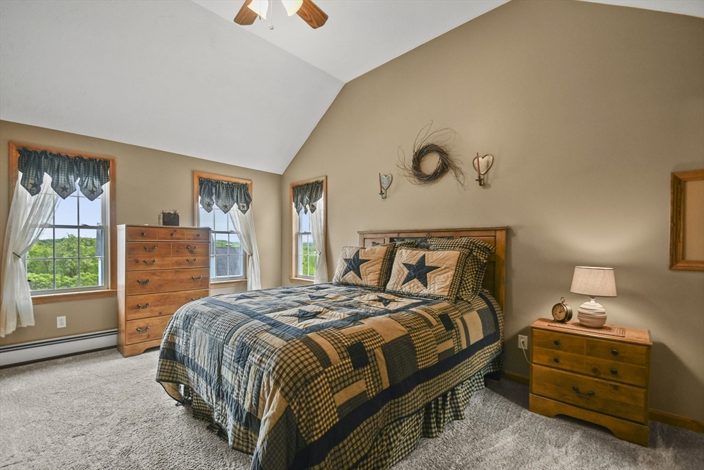18 Jackson Avenue Rutland, MA 01543 - Photo 10 of 24 a bedroom with a bed and window