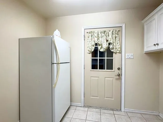 a view of walk in closet with window