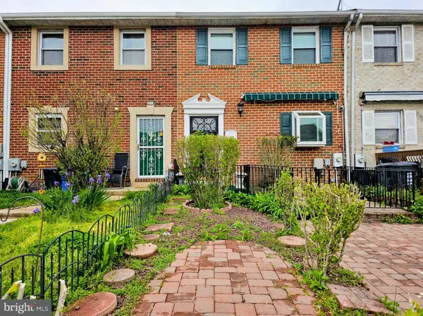 a front view of a house having yard