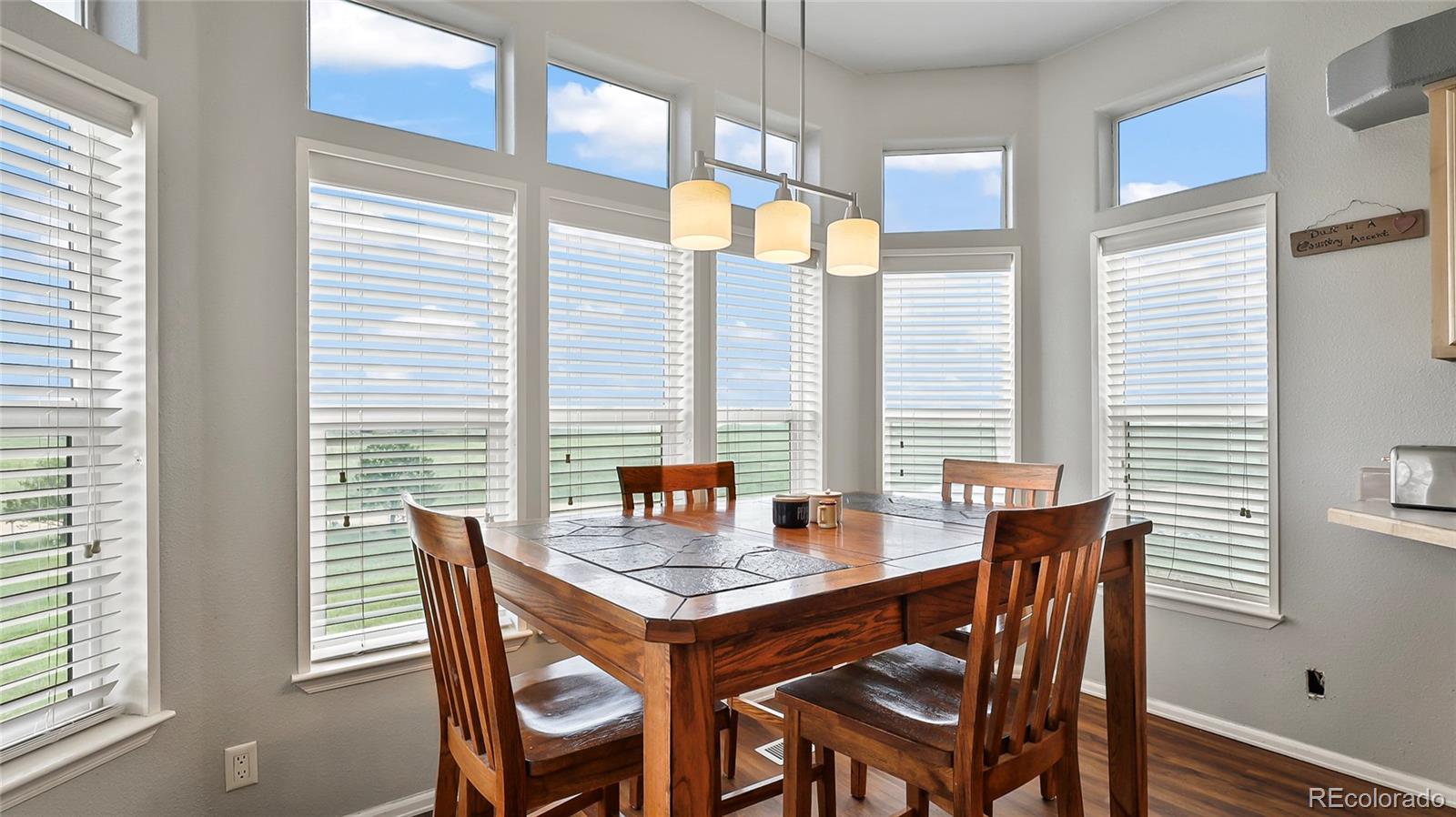 48984 County Road Akron, CO 80720 - Photo 12 of 35 a view of a dining room with furniture and window