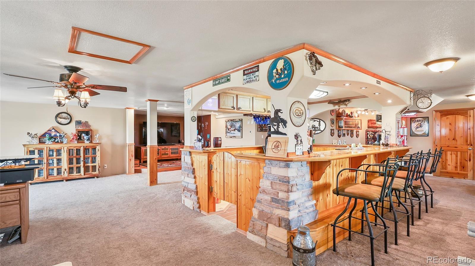 48984 County Road Akron, CO 80720 - Photo 4 of 35 a view of a dining room with furniture and a chandelier