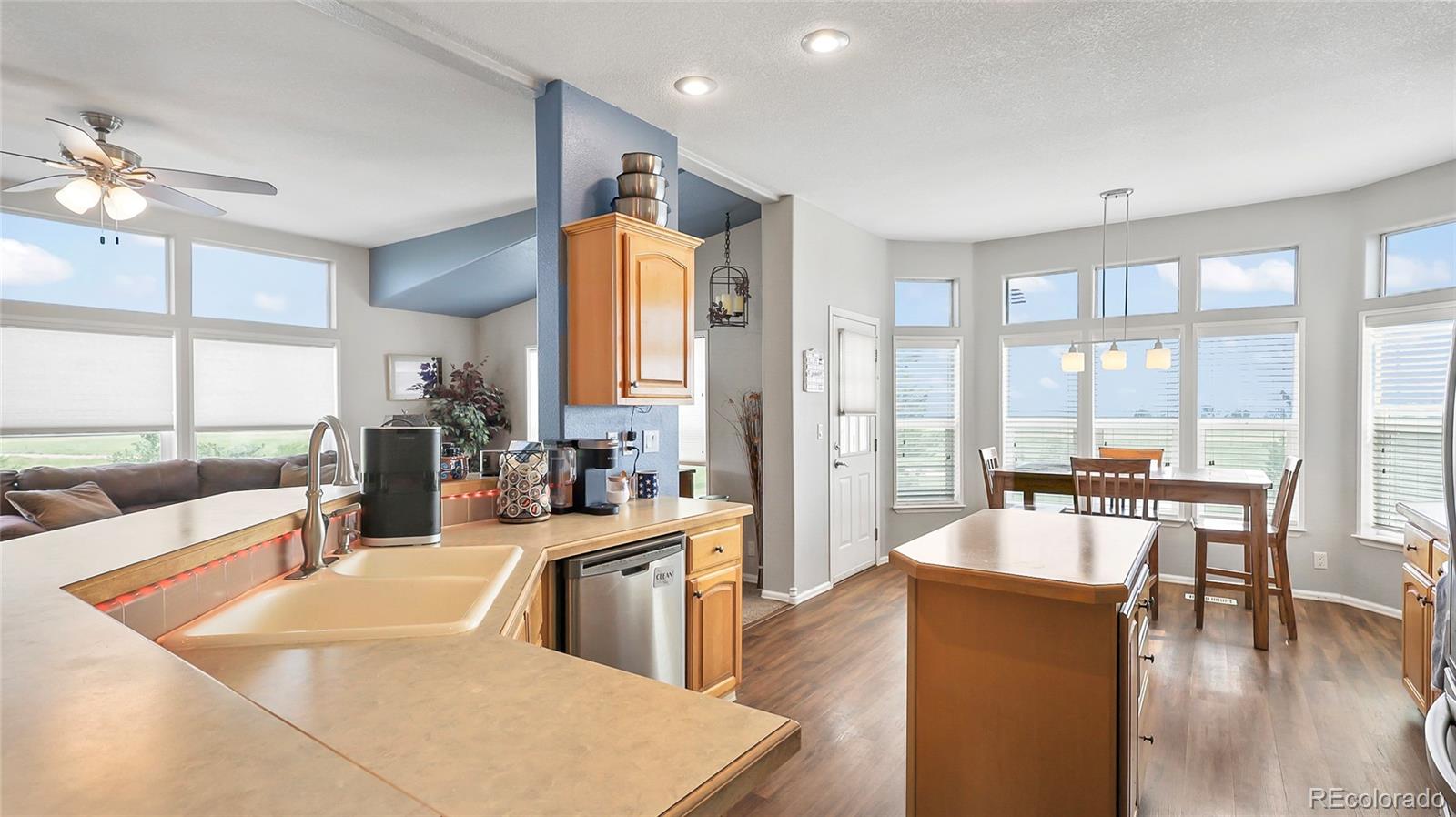 48984 County Road Akron, CO 80720 - Photo 10 of 35 a large living room with large windows
