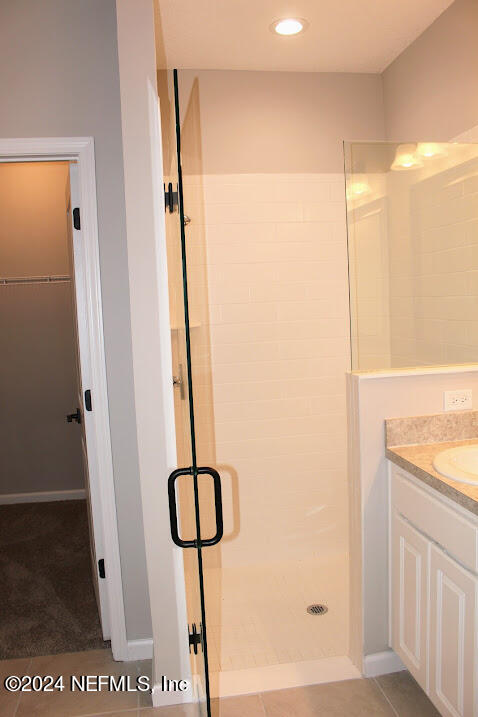 4146 Quiet Creek Loop, Unit 131 Middleburg, FL 32068 - Photo 23 of 39 a view of a bathroom with a shower