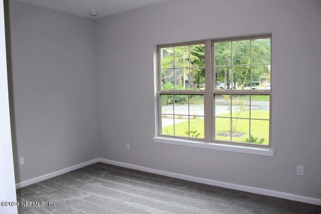 4146 Quiet Creek Loop, Unit 131 Middleburg, FL 32068 - Photo 29 of 39 an empty room with a window