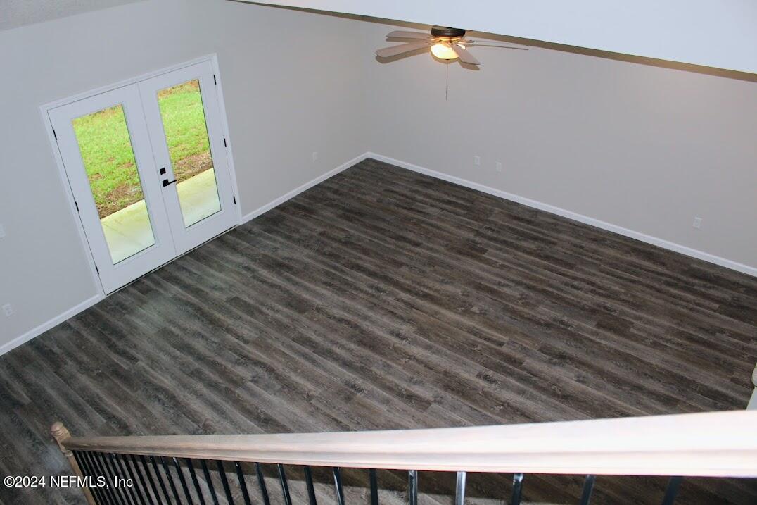 4146 Quiet Creek Loop, Unit 131 Middleburg, FL 32068 - Photo 32 of 39 a view of a room with wooden floor