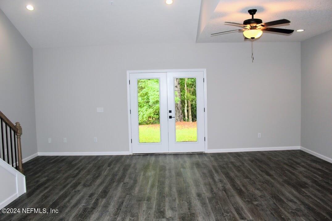 4146 Quiet Creek Loop, Unit 131 Middleburg, FL 32068 - Photo 9 of 39 a view of a room with wooden floor and a window