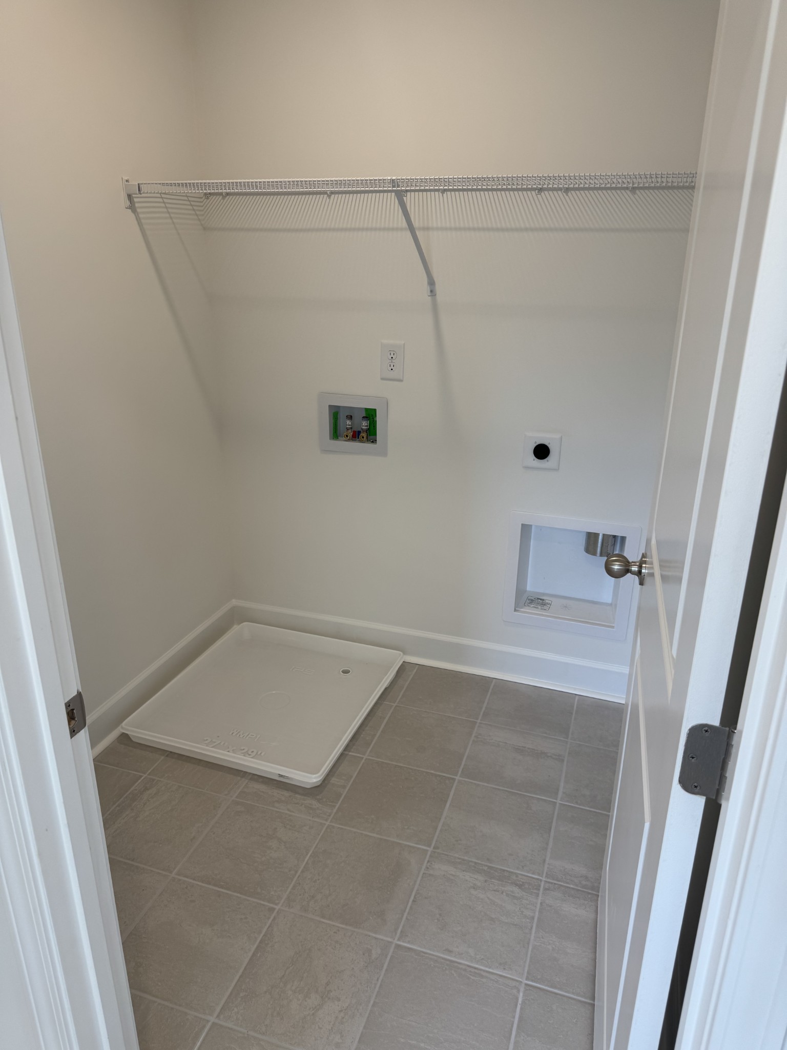 1110 June Wilde Ridge Spring Hill, TN 37174 - Photo 14 of 28 a view of a room with rack on the wall