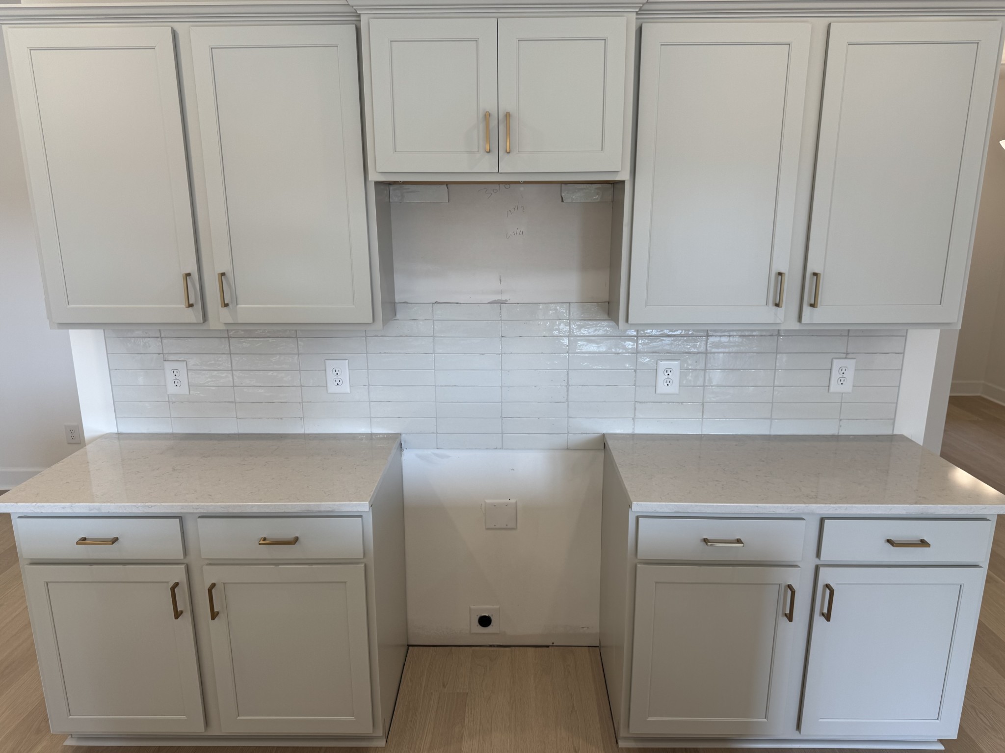 1110 June Wilde Ridge Spring Hill, TN 37174 - Photo 9 of 28 a kitchen with white cabinets and a sink