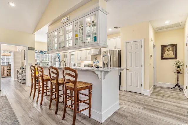 $575,000 | 939 Oyster Pointe Drive, Sunset Beach, NC 28468