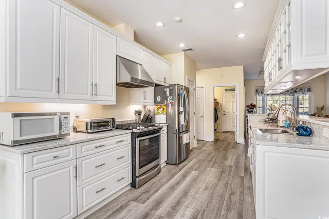 $575,000 | 939 Oyster Pointe Drive, Sunset Beach, NC 28468