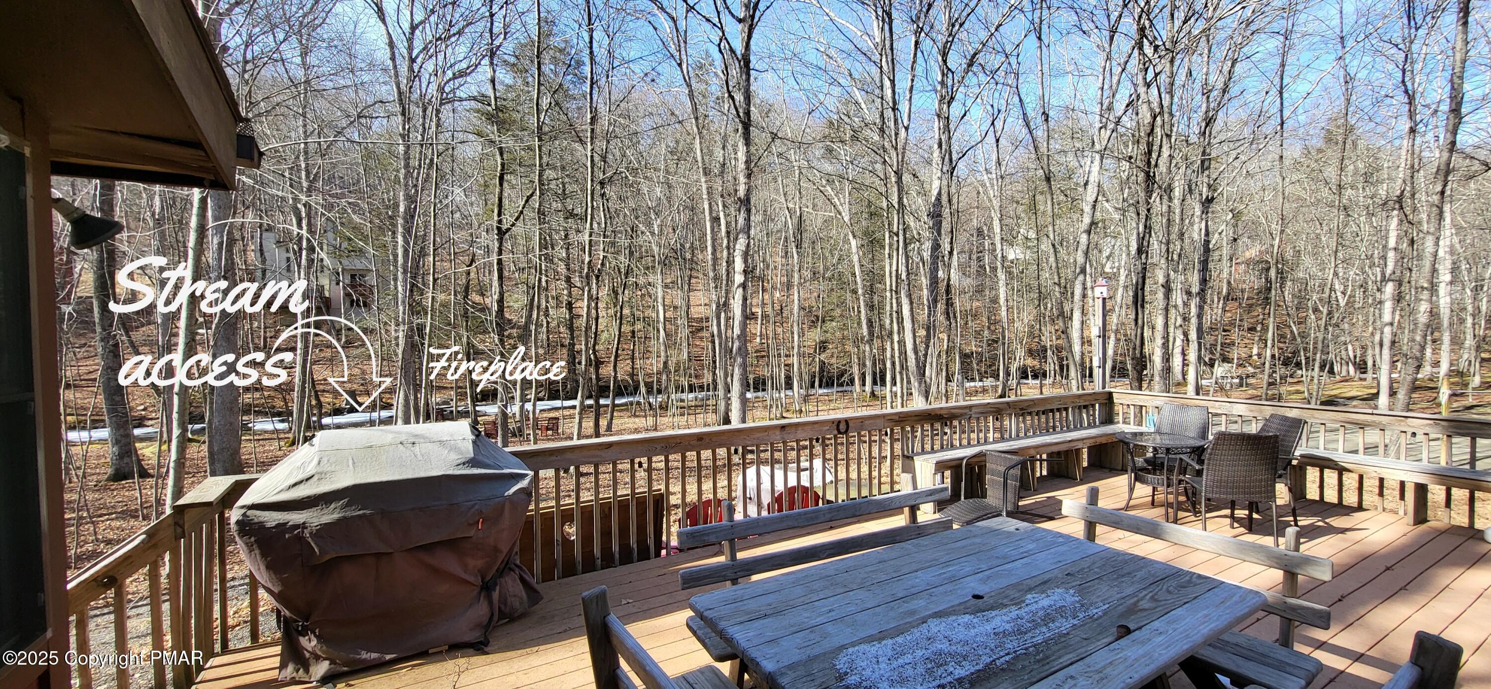 6298 Decker Road Bushkill, PA 18324 - Photo 6 of 65 a view of balcony with wooden floor and outdoor seating