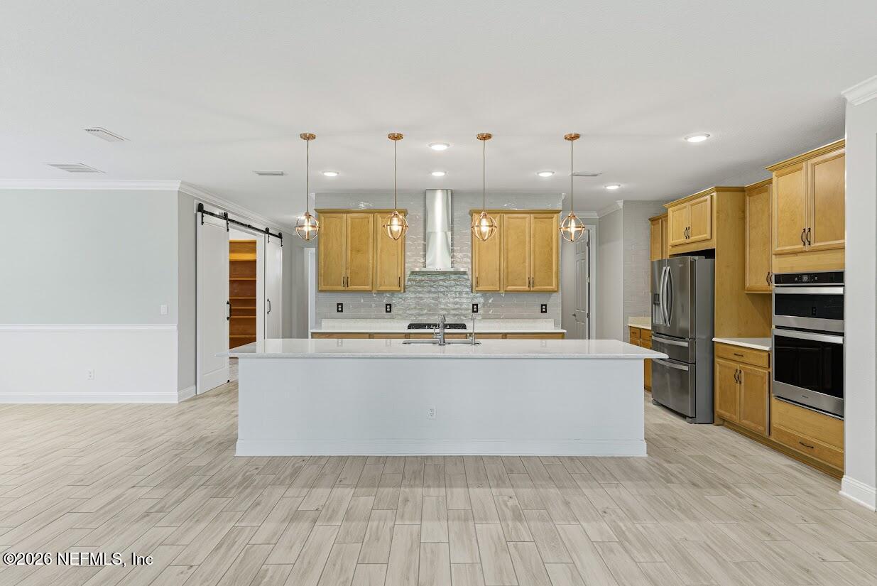 106 Key Grass Court St. Johns, FL 32259 - Photo 13 of 80 a view of kitchen with kitchen island and stainless steel appliances