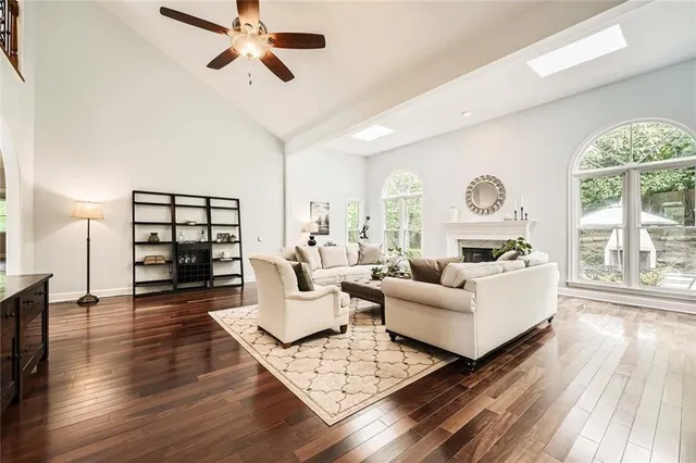a kitchen with granite countertop a sink appliances and cabinets