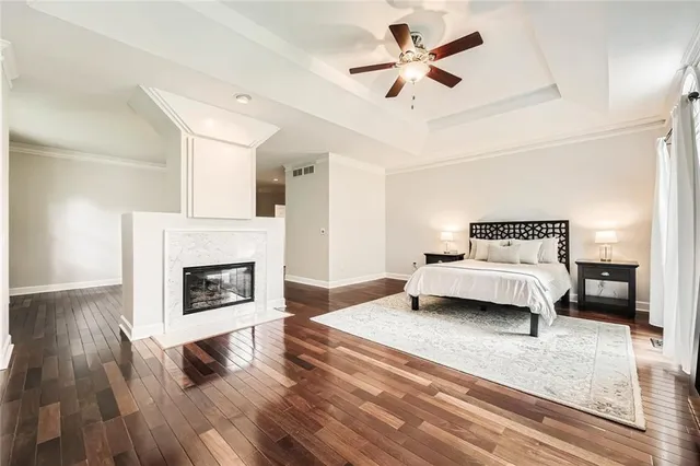 a spacious bathroom with a double vanity sink and a mirror