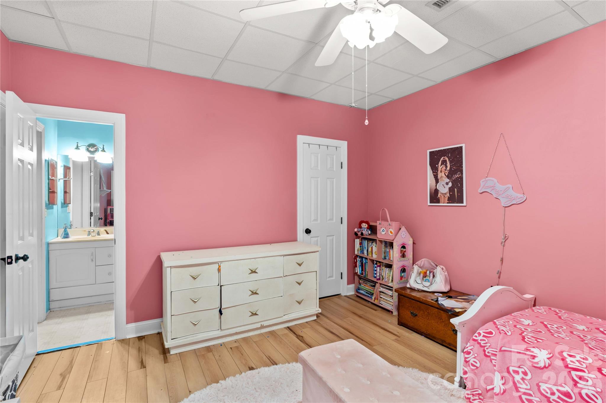 711 Spring Pointe Drive Stony Point, NC 28678 - Photo 26 of 47 a bedroom with a bed and a dresser in it
