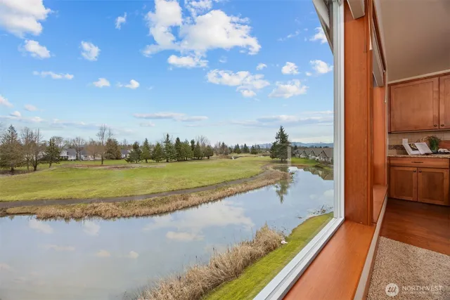 a bedroom with a bed and lamps