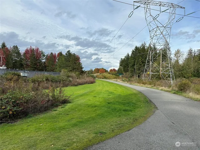 a view of a lake with a big yard