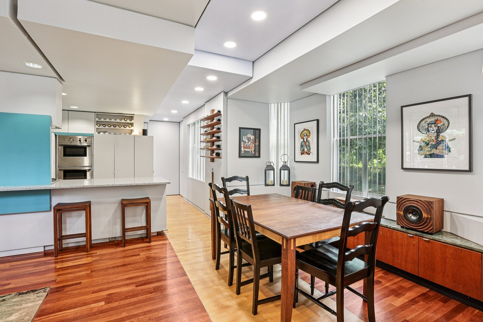 1003 Wesley Avenue Evanston, IL 60202 - Photo 14 of 35 a view of a dining room with furniture and wooden floor
