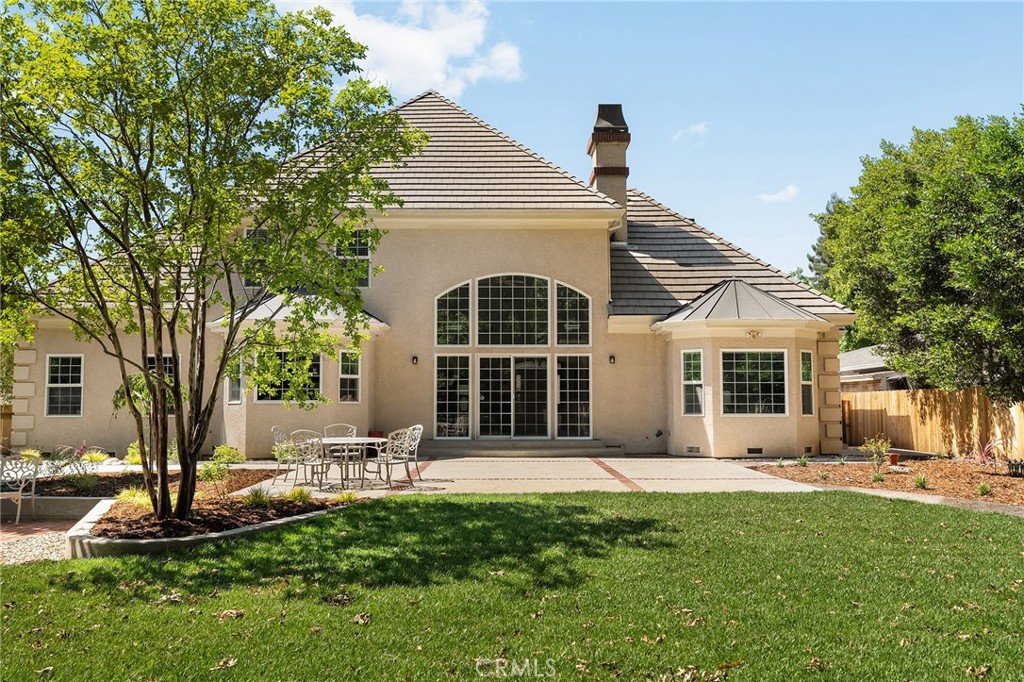 897 Filbert Avenue Chico, CA 95926 - Photo 53 of 66 a front view of a house with garden and trees