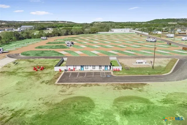 a big room with table and chairs