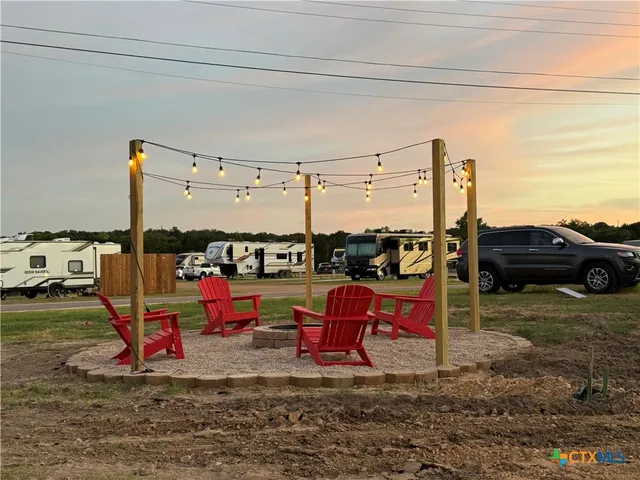 a view of a swimming pool with a yard