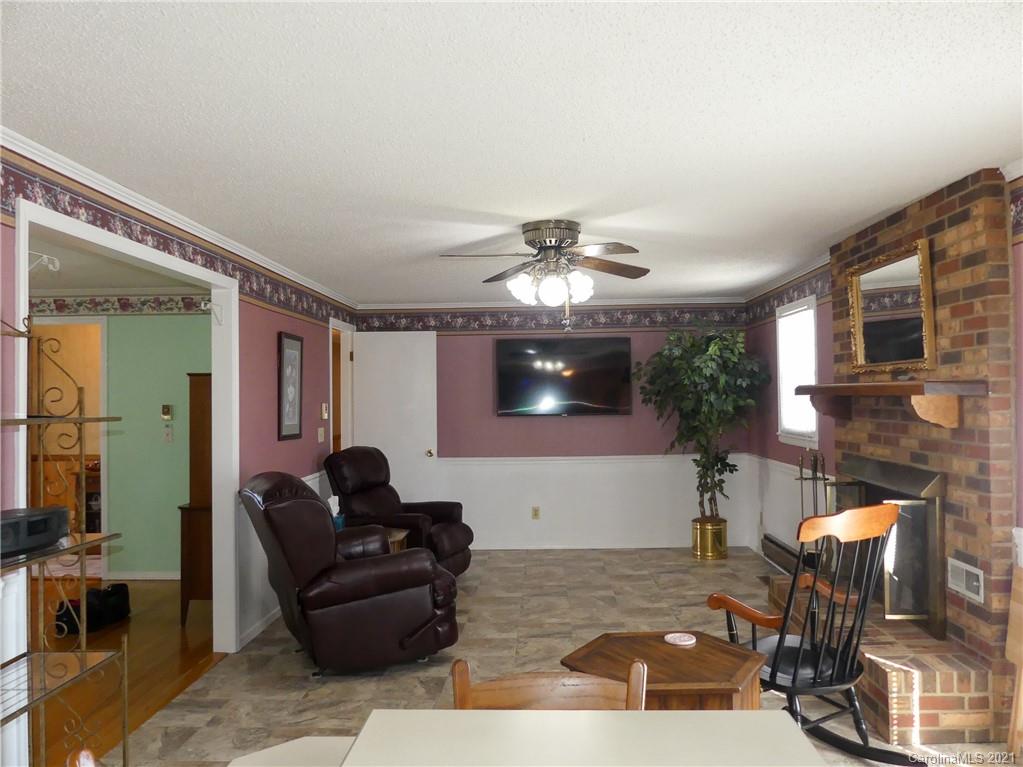 401 Poors Ford Road Rutherfordton, NC 28139 - Photo 14 of 34 a living room with furniture and a flat screen tv