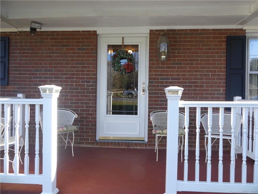 401 Poors Ford Road Rutherfordton, NC 28139 - Photo 3 of 34 a front view of a house with a porch