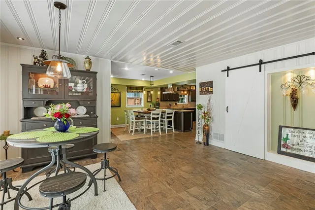 a view of a dining room with furniture