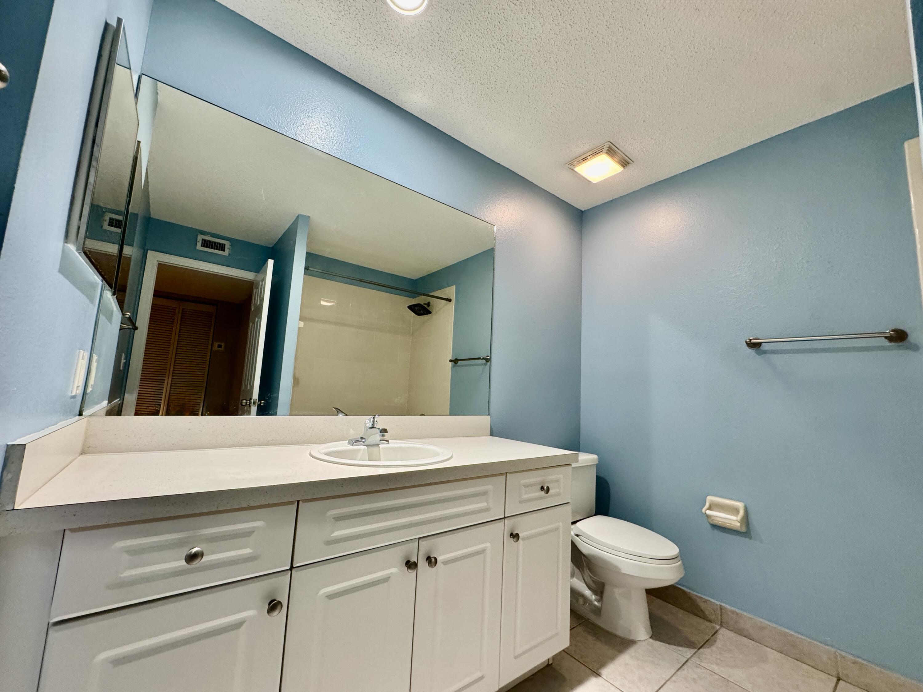 2216 White Pine Circle, Unit D Greenacres, FL 33415 - Photo 11 of 29 Bathroom 1
