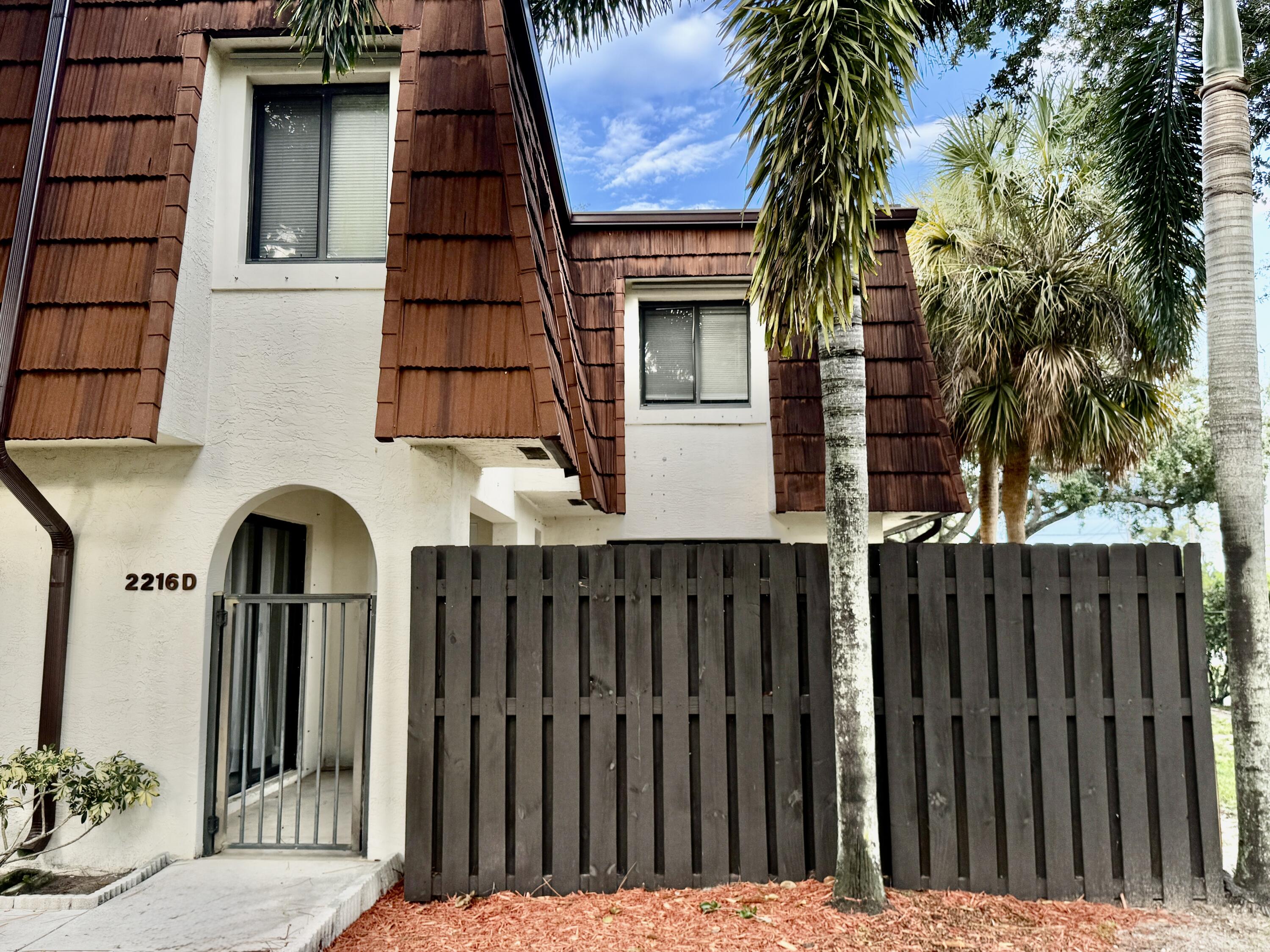 2216 White Pine Circle, Unit D Greenacres, FL 33415 - Photo 2 of 29 Front of Home