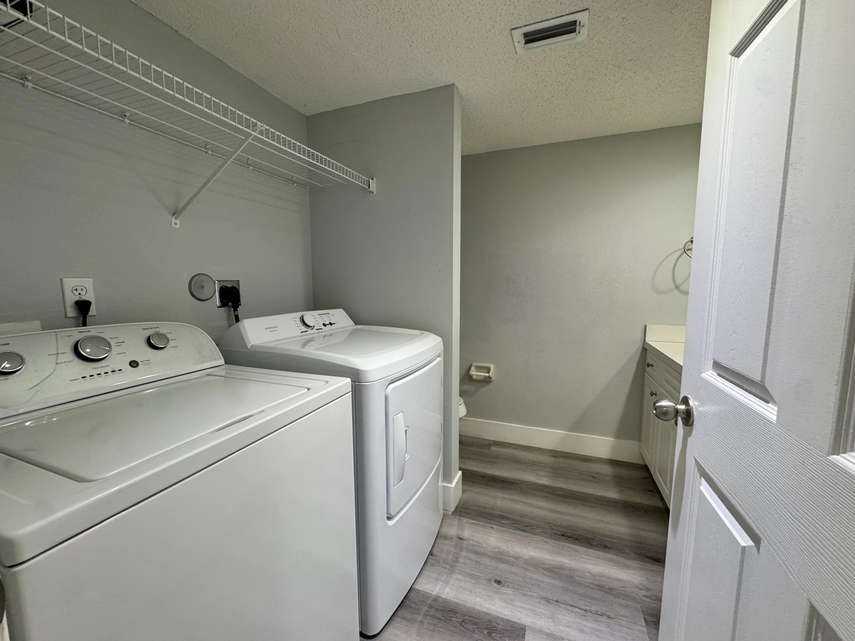 2216 White Pine Circle, Unit D Greenacres, FL 33415 - Photo 7 of 29 Laundry/Guest Bath