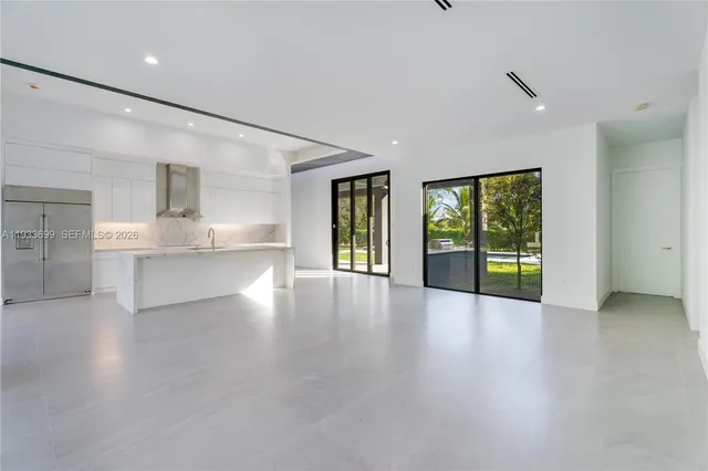 a bathroom with a bathtub a sink a vanity and a shower