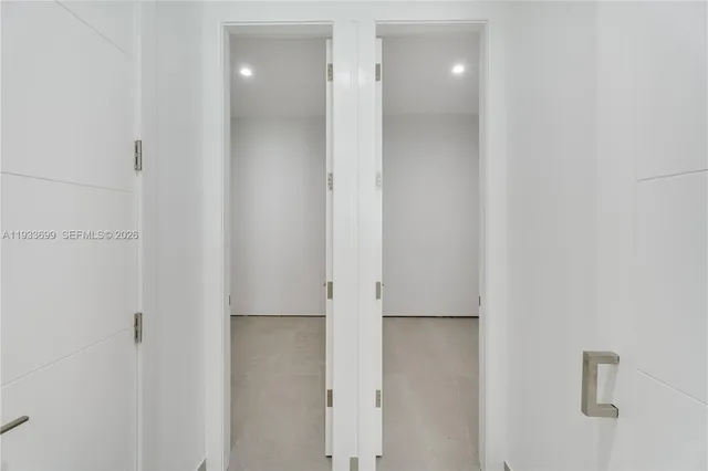 an aerial view of residential house with an outdoor space and seating